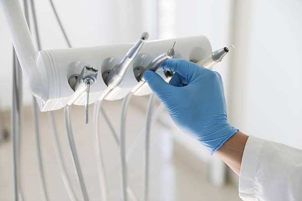 Professional Tooth Extraction technician working in Lawrenceville, GA